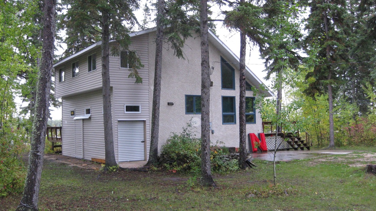 Adventure Awaits at this Lakeside Retreat, #9 Rocky Lake North!