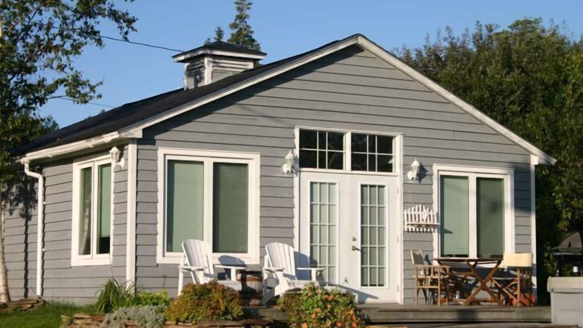 Charming Modern Cottage with water views and private Spa. Quiet Coastal Location