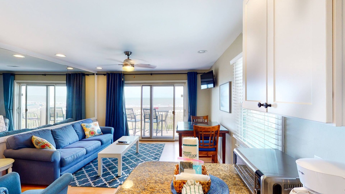 Charming coastal retreat with beach access, private balcony, & pool - near golf