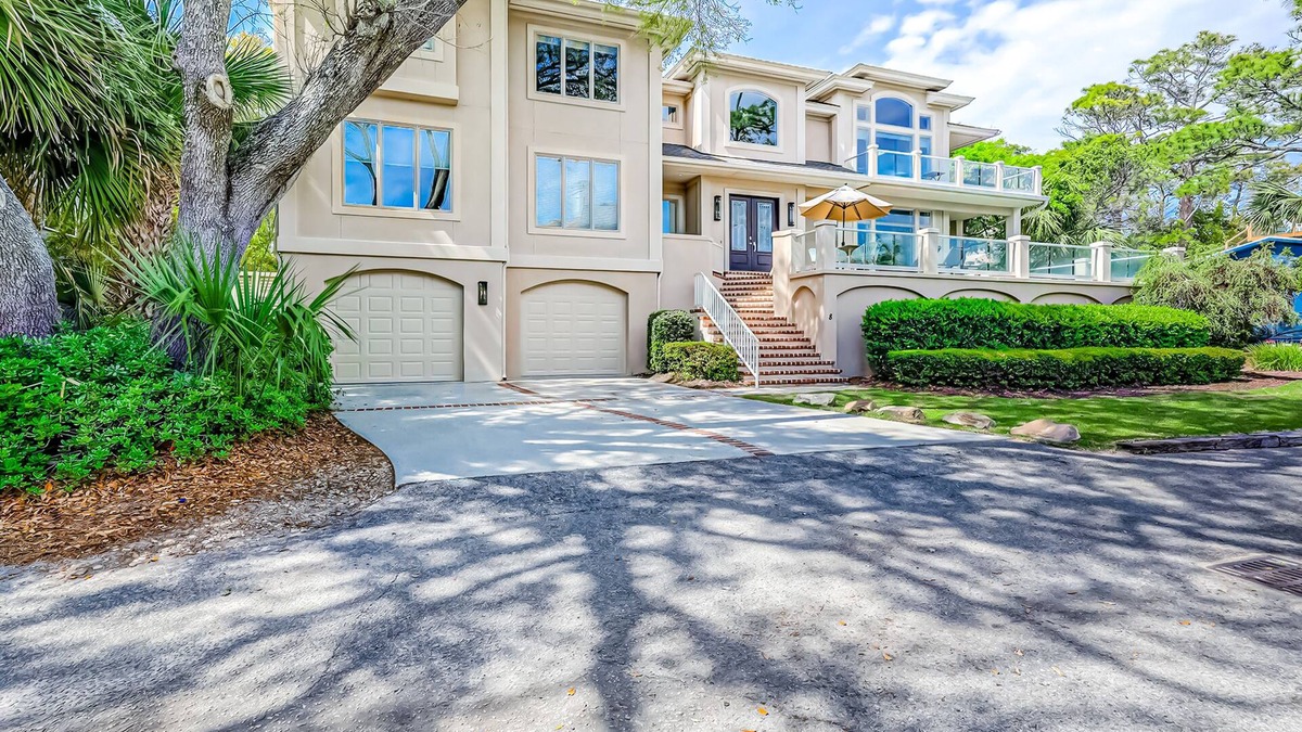 Conveniently located, gorgeous home with private pool & elevator - walk to beach