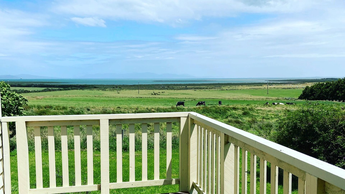 Cottage on orchard acreage with ocean views
