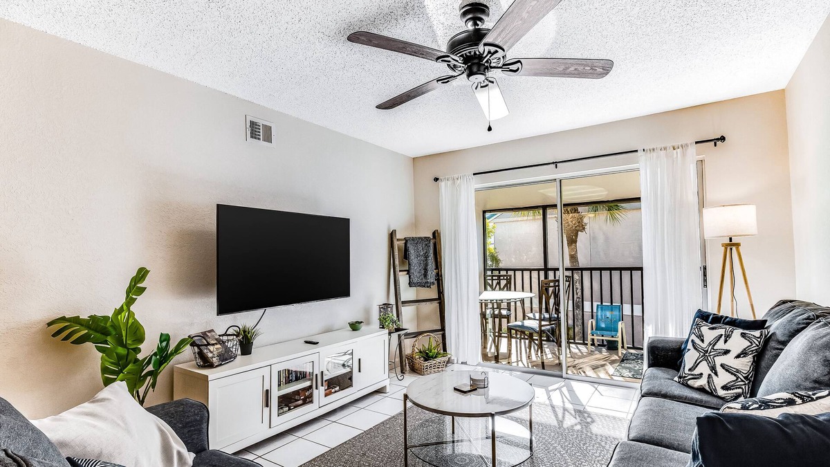 Dog-friendly condo with pool and tennis access, central AC, balcony, and AC