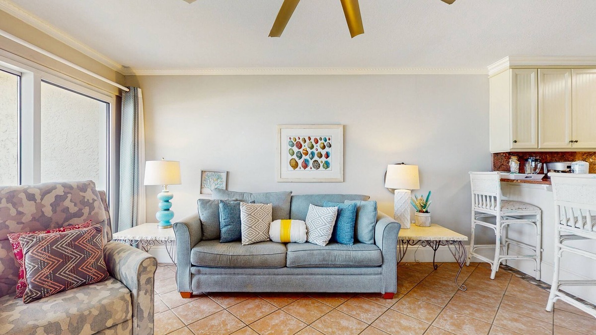 Lovely beachfront condo with water views from private balcony + shared pool
