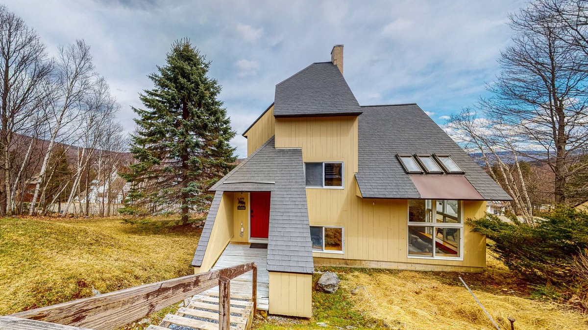 Mountain-view home with new deck, fireplace, W/D, & shared pool - walk to lifts
