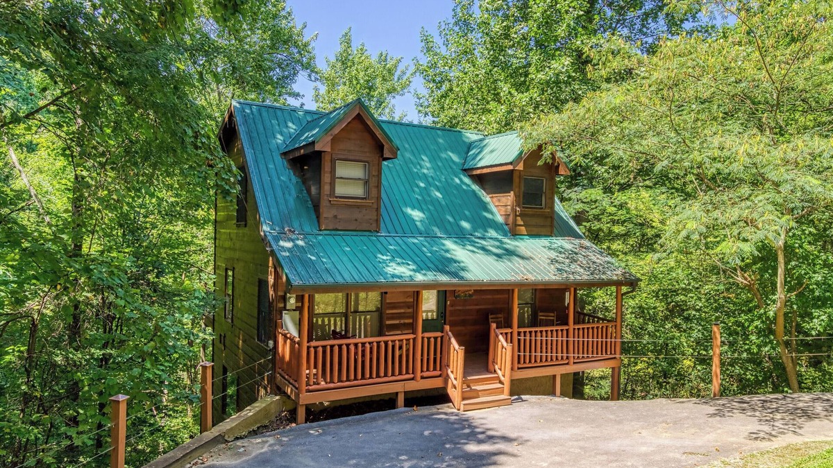 Private Wooded Setting! Theater Room! Centrally Located! 3 Decks! Fun Game Room