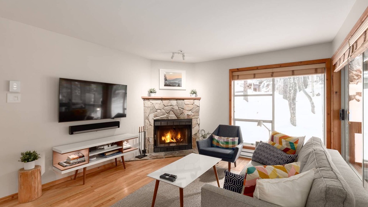 Updated, bright & cozy corner unit with private bike/ski storage and free parking
