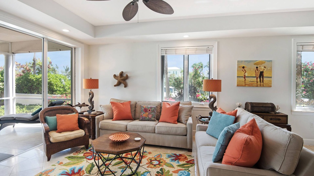 Walk Out of this Elegant 2 Bedroom Condominium On To Stunning Grace Bay Beach!