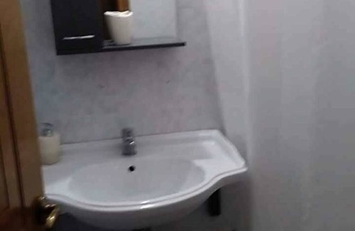 Ilioupoli Apartment | Το Calma apartment έχει θέα στον κήπο και διαθέτει βεράντα και μπαλκόνι.