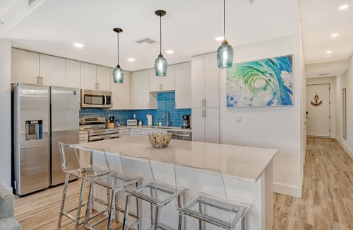 Newtown Condo | 1/1.5 Modern Waterfront Condo with Pool and Fitness Room