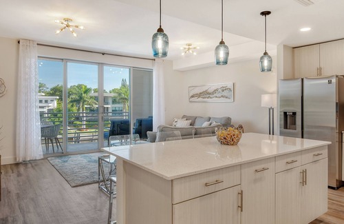Newtown Condo | 1/1.5 Modern Waterfront Condo with Pool and Fitness Room