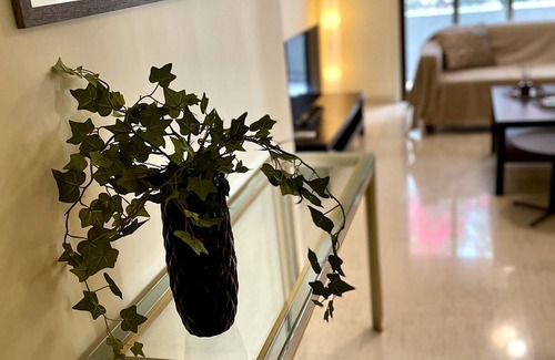 Acropolis Apartment | 1-BDR with covered parking free Wi Fi next to KPMG