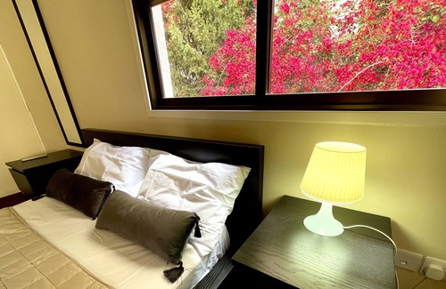 Acropolis Apartment | 1-BDR with covered parking free Wi Fi next to KPMG