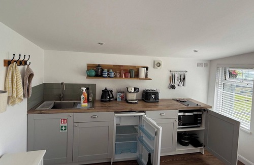 Saint Ann's Chapel Cabin | 1 Bed Cabin-Sleeps 2, Hot Tub, Garden, Pets, Views