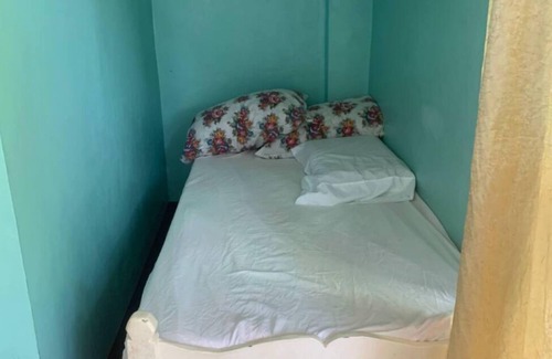San Remigio Bed & Breakfast | 1 Bed with full bath AC, Rooftop and walking distance to beach