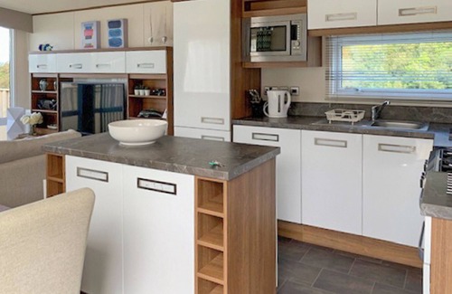 Tan-y-groes Ski Chalet | 1 bedroom accommodation in Tresaith Beach, Cardigan, Ceredigion