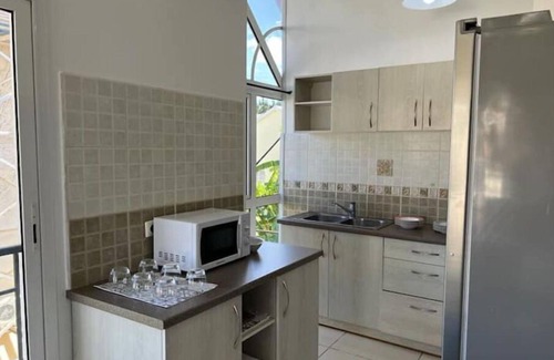 Antananarivo Avaradrano Apartment | 1 Bedroom Apartment with Air Conditioning 85 m² - Kitchen and Terrace