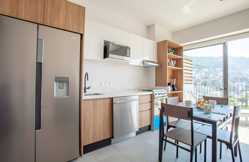El Caloso Condo | 1 Bedroom Condo with River & Partial Ocean View in Luxury New Building!