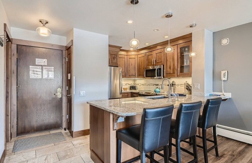 Historic District Condo | 1 Bedroom, Deck Above Blue River! Easy Walk Around Breck! Mountain Views, Garage