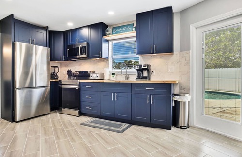 Fort Myers Beach House | 1 BLOCK FROM BEACH - VAN & GOLF CART ALSO AVAILABLE FOR RENTAL! POOL & HOT TUB!