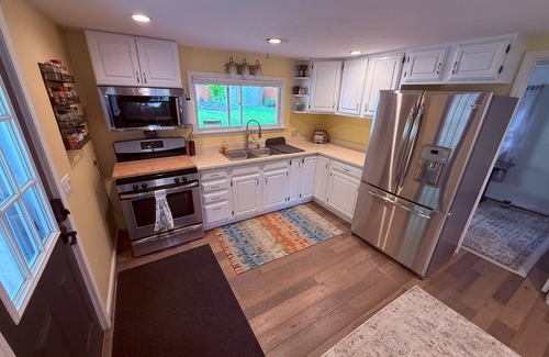 Charlevoix House | 1+ block from Lake Michigan Beach 3 bedroom house in Charlevoix with WiFi and AC