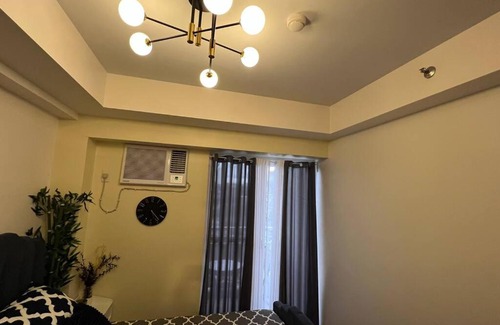 A. Bonifacio Apartment | 1-BR Condo Unit at The Celandine with Refreshing Balcony-view of the Pool