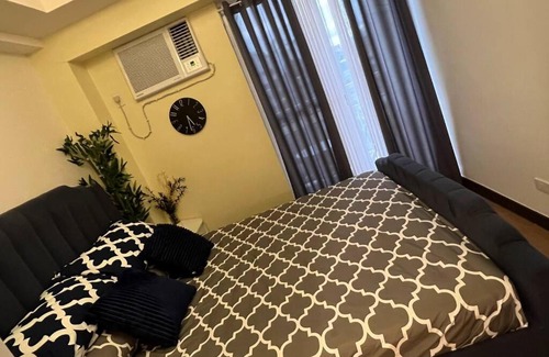 A. Bonifacio Apartment | 1-BR Condo Unit at The Celandine with Refreshing Balcony-view of the Pool