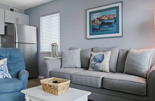 Fort Morgan Condo | 1 BR Snowbird Escape with Balcony Views: Book 2+ Months & Get Exclusive Perks!