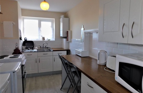 Sheringham Apartment | 1 Driftway Court - a well-appointed ground floor apartment, featuring open plan living/dining room.