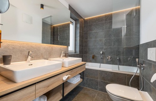 Rain Apartment | 1-schlafzimmer Suite mit Badewanne NRF BF - Hotel Stockinggut by Avenida Leogang