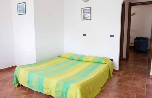 Torre di Bari Apartment | 1 two-room apartment to the sea, with veranda, sun umbrella and outdoor furniture