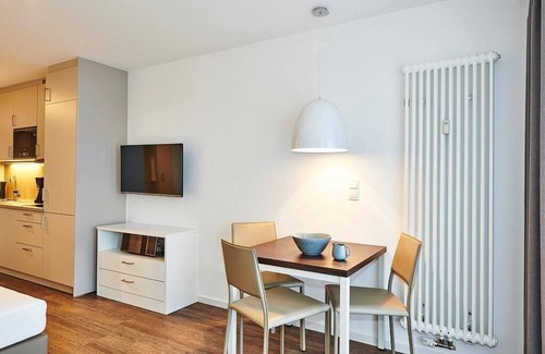 Bensersiel Apartment | 1-zimmer Apartment in Strandnähe mit Balkon und Inkl. Schwimmbad- & Saunanutzung