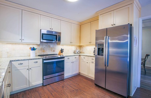 West Beach House | 10 Minute Walk to Beach! Two Master Suites, Bunk Bedroom, Den with Pool Table, Expansive Back Porch