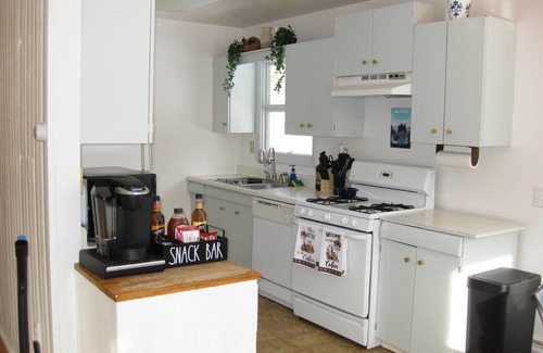 Sand Lake House | 10 minutes from the airport. Lots of amenities! Private acre.