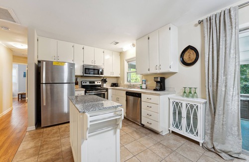 Folly Beach House | 1010 E Ashley -Two Living Rooms and Kitchens - Porch - Steps to the Beach!