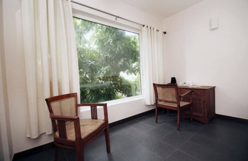 Kochi House | 104 DOUBLE ROOM WITH SINGLE COTS
