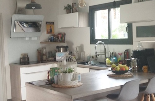 Leguevin House | 107 M2 family home with large living room