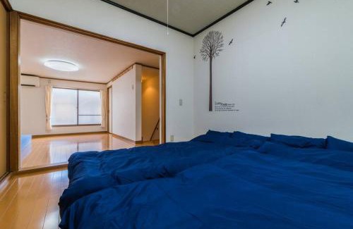 Nishi Apartment | 11 min to USJ, 6 min to Nanba, 3R house for max 9