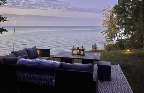 Cheboygan Cottage | 125 ft of Private BEACHFRONT with large, secluded yard & spectacular views!