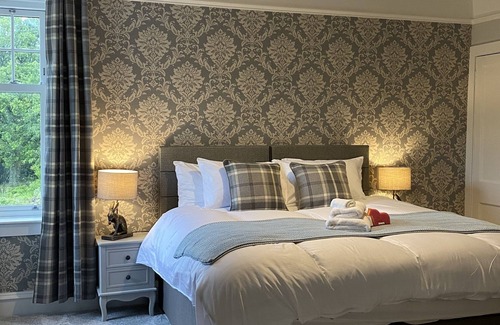 Maybole House | 18 person 9 en-suite bedroom country house in Ayrshire with hot tub & sauna