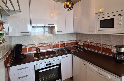 Nerja Apartment | 180° panoramic sea view, 23m² south terrace, WiFi, 2 air-conditioning, fireplace