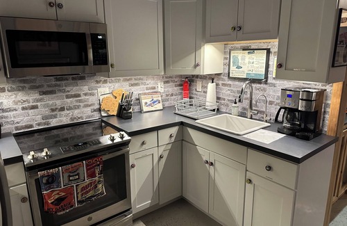 Hillsdale House | 1929 Man cave apartment with 1 bedroom and AC, fiber optic WiFi in Hillsdale