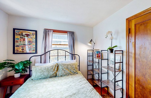 West End House | 1940s cottage with oak flooring, grill, hammock, & water views - dog-friendly