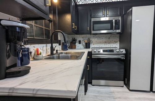 Brookline Station Apartment | 1BR/1BA Walk-Out Basement W/Hot Tub Pet Friendly