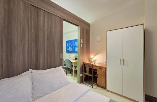 Highway Hills Apartment | 1BR Condotel with Balcony at FAME Residences #FM62-1