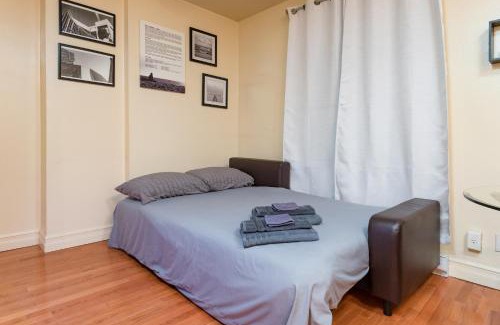 Theatre District Apartment | 1BR in the Heart of Downtown Boston Famous Nightlife Theater District with Bed Full of Promises TD Garden Common Park MBTA
