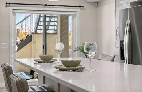 Sage Hill Apartment | 1BR Walk Out Suite » Backyard » Patio » 65” TV