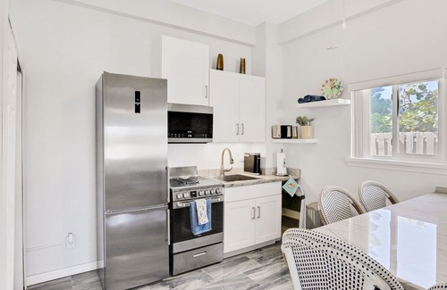 New Smyrna Beach House | 1st-floor beachfront home with outdoor shower, patio, grill, ocean & beach views