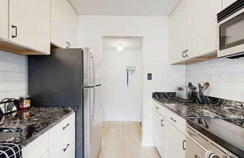 Caine Woods Condo | 1st-floor condo near the ocean & beaches with seasonal pool, tennis, patio, AC