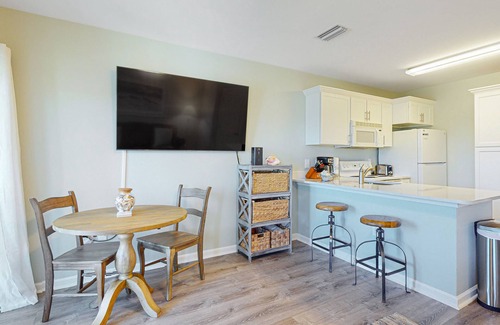 Orange Beach Condo | 1st floor condo with peek-a-boo Gulf views, balcony, central AC, WiFi, & pool