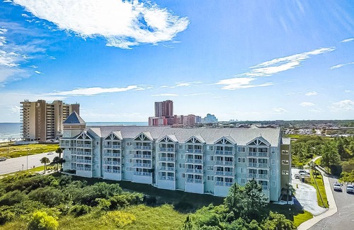 Orange Beach Condo | 1st floor condo with peek-a-boo Gulf views, balcony, central AC, WiFi, & pool